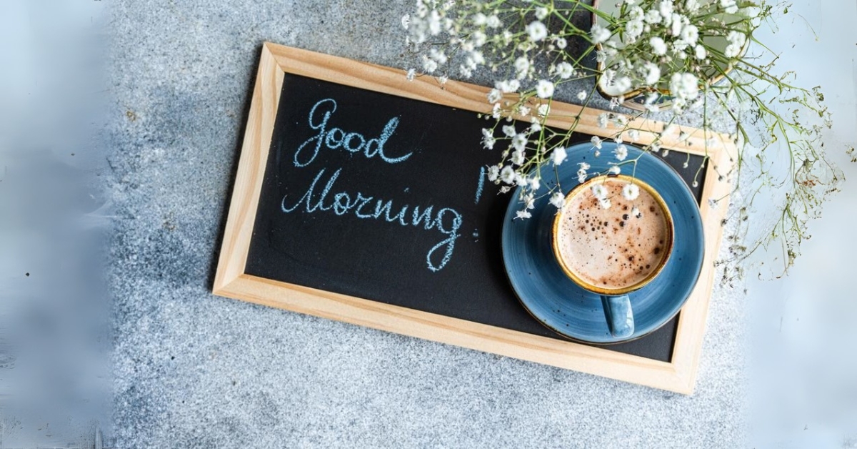 good morning blessings with coffee cup and green plant